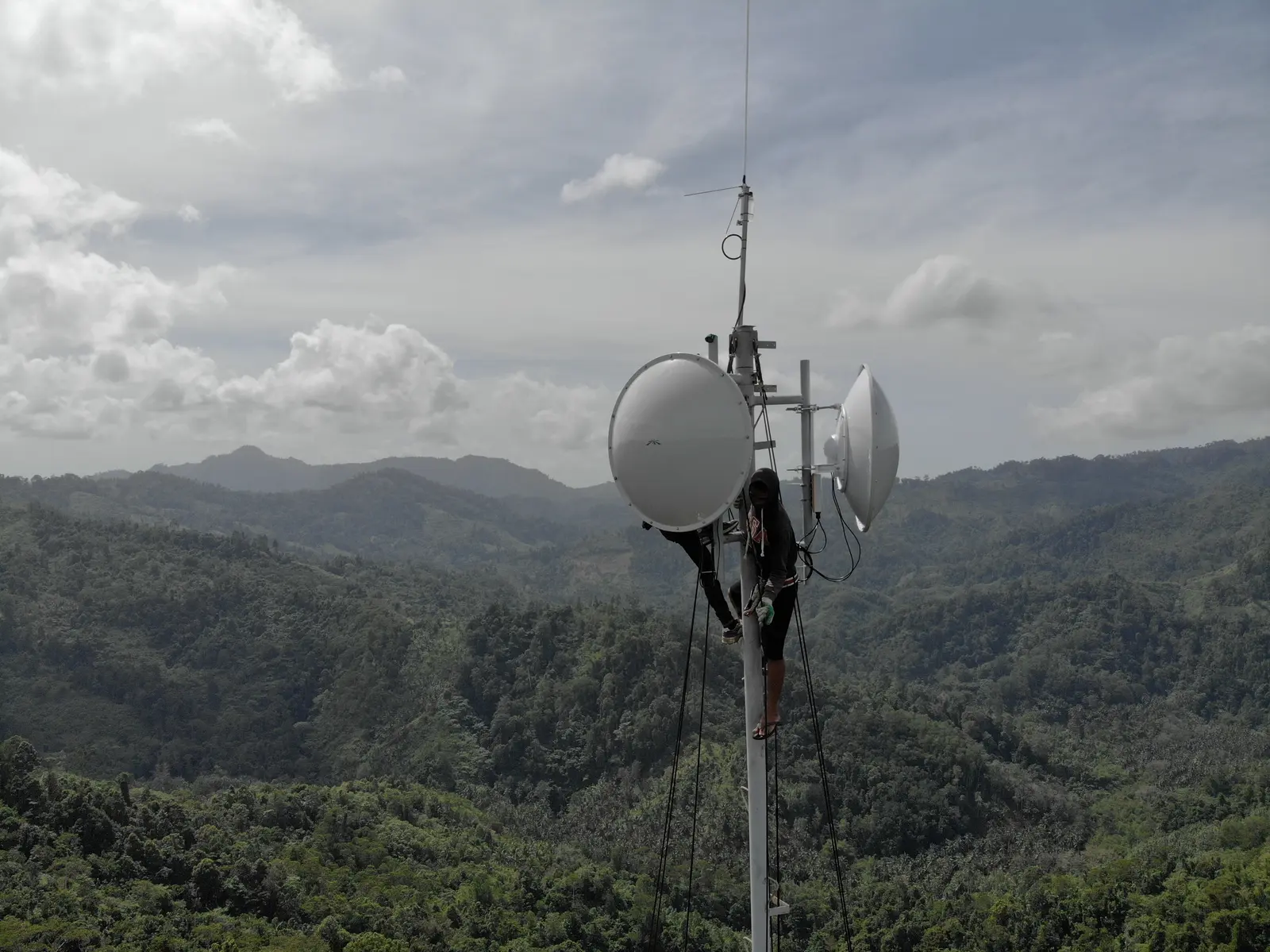 ATECH wireless relay dishes at a remote mountain site.
